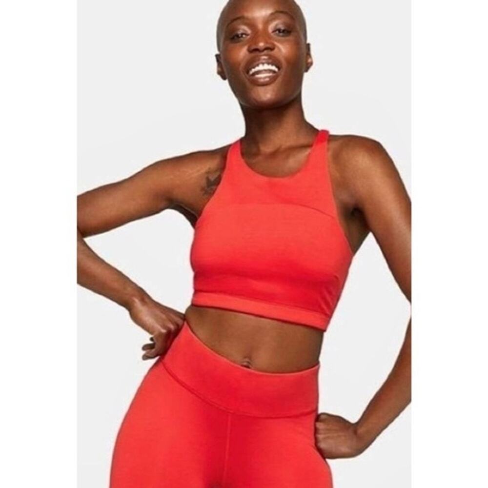 Outdoor Voices Tech Sweat Crop Top in red.